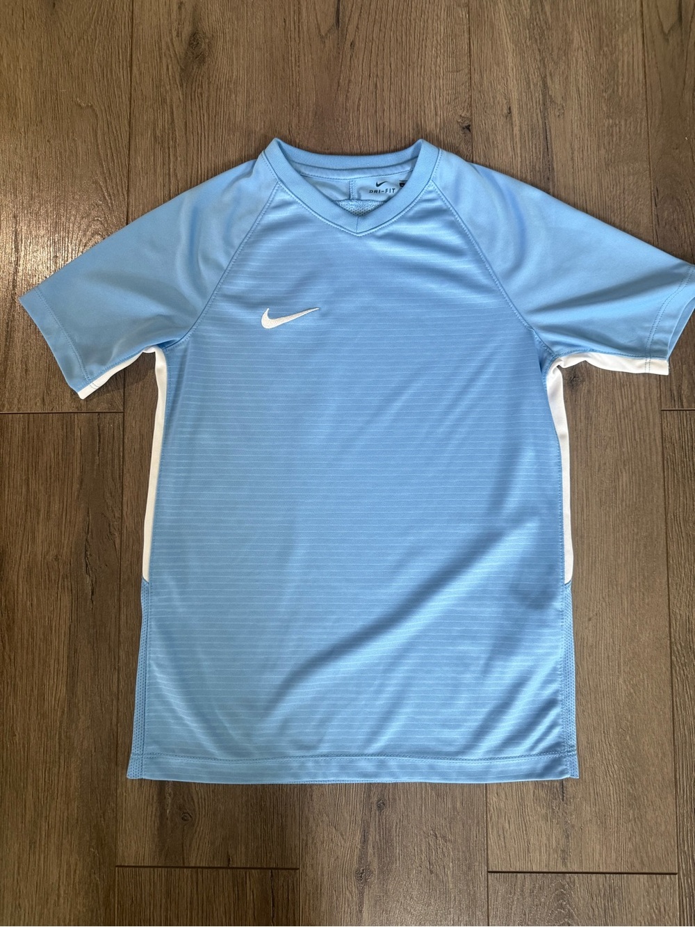 Nike Light Blue Short-Sleeve Athletic Jersey with White Accents